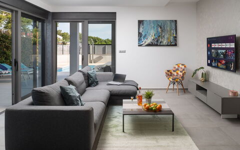 Villa Fasana: Mueble, Diseño De Interiores, Sofá, Sala, Piso, Suelo, Mesa, Mesa De Café, Arrojar La Almohada
