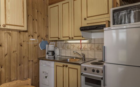 Ylläskarpalo 1 Päätyhuoneisto: Cocina, Madera, Mostrador, Gabinetes, Piso, Techo, Suelo, Electrodoméstico, Aparato De Cocina, Diseño De Interiores