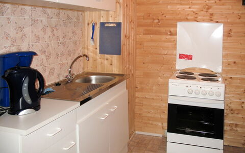 Schöser: Habitación, Mostrador, Propiedad, Cocina, Electrodoméstico, Loseta, Gabinetes, Mueble, Suelo, Estufa De Cocina
