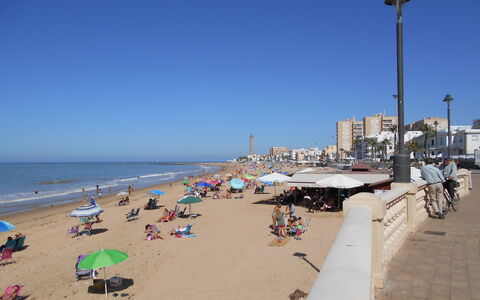 Apartamento Caracola: Agua, Cielo, Playa, Luz De La Calle, Bicicleta, Sombra, Arena, Horizonte