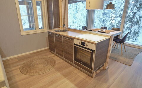 Iso-Karpalo B: Piso, Madera, Suelo, Suelos De Madera, Diseño De Interiores, Mueble, Mostrador, Cocina, Manchas De Madera, Suelo Laminado