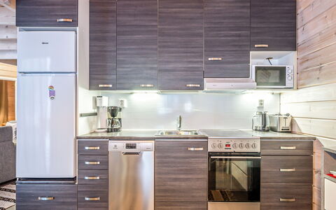 Villa Rukan Kesäniemi: Cocina, Aparato De Cocina, Madera, Electrodoméstico, Piso, Gabinetes, Mostrador, Electrodoméstico, Diseño De Interiores, Mueble