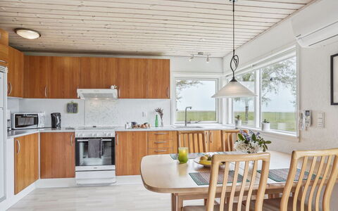 Rayla - 150M from the Sea: Diseño De Interiores, Piso, Mueble, Madera, Techo, Suelo, Cocina, Lámpara, Mostrador, Suelos De Madera