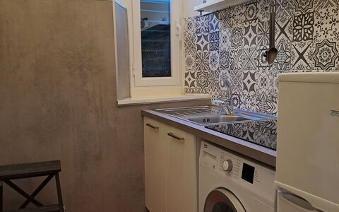 A Due Passi da Camogli, Seaview with Terrace, Wifi: Cuarto De Lavado, Secadora De Ropa, Lavadora, Propiedad, Lavandería, Electrodoméstico, Diseño De Interiores, Suelo, Piso, Electrodoméstico
