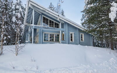 Aurinkoinen Hirsimökki