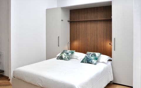 Suite Trastevere: Mueble, Madera, Habitación, Diseño De Interiores, Piso, Suelo, Cama, Lecho, Sábana, Habitación