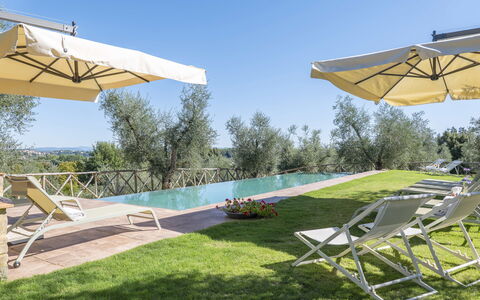 Villa del Mangia - Luxury Villa with Infinity Pool: Azul, Piscina, Mueble Para Exteriores, Silla, Sunlounger, Paisajismo, Villa, Eco Hotel, Recurso, Plantación