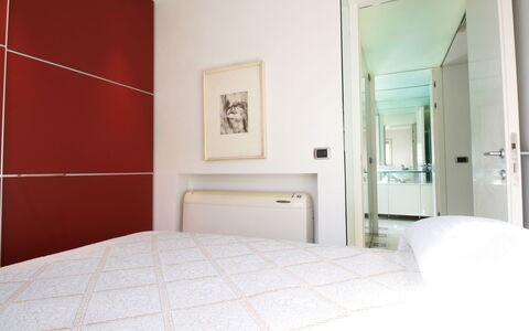 Villino Sonia: Diseño De Interiores, Piso, Suelo, Madera, Habitación, Mueble, Cama, Habitación, Techo, Casa