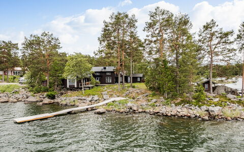 Huset På Udden: Agua, Casa, Cabaña, Banco, Costeras Y Los Accidentes Geográficos Oceánico, Casa, Costa, Apuntalar, Lago, Sonido