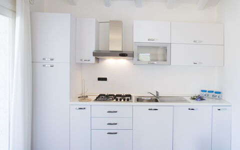 Villa Asparago: Cocina, Electrodoméstico, Aparato De Cocina, Mostrador, Gabinetes, Diseño De Interiores, Estufa De Cocina, Electrodoméstico, Fregadero, Piso