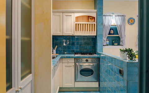 Suite la Torre: Cocina, Mostrador, Aparato De Cocina, Electrodoméstico, Diseño De Interiores, Piso, Gabinetes, Suelo, Habitación, Electrodoméstico