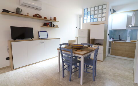 Malika: Mueble, Piso, Diseño De Interiores, Madera, Suelo, Habitación, Departamento, Gabinetes, Mostrador, Cocina