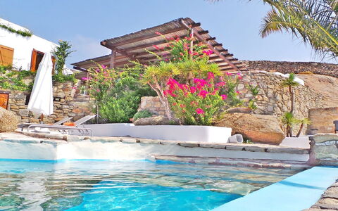 Villa Zenas with Direct Access to the Sea: Piscina, Recurso, Eco Hotel, Paisajismo, Hacienda, Fuente De Agua, Villa, Paraguas, Hotel