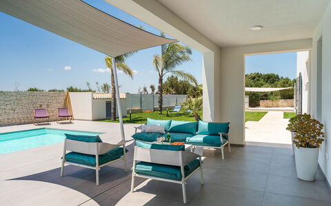 Il Palmeto: Mueble, Mueble Para Exteriores, Silla, Diseño De Interiores, Recurso, Sombra, Mesa, Piscina, Suelo, Eco Hotel
