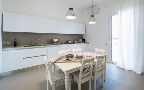 Villa Emma: Diseño De Interiores, Mueble, Piso, Madera, Cocina, Techo, Suelo, Mostrador, Habitación, Encendiendo