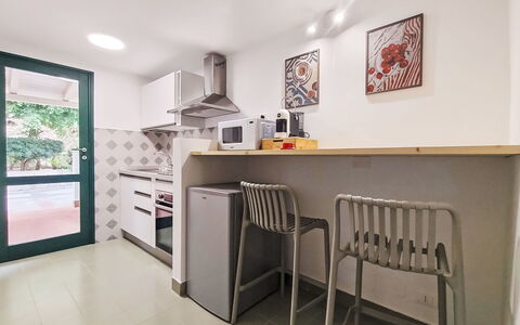 Cala Isulidda: Cocina, Aparato De Cocina, Diseño De Interiores, Electrodoméstico, Piso, Mueble, Madera, Mostrador, Suelo, Techo