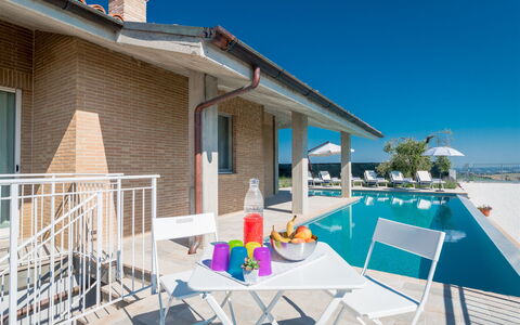 Casa di Eolo 8+2: Piscina, Mueble Para Exteriores, Mueble, Recurso, Silla, Material Compuesto, Ocio, Sunlounger, Sombra, Villa
