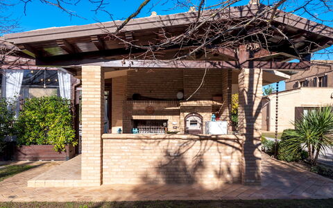 Villa Isotta 8+4: Mueble, Techo, Sombra, Porche, Estructura Al Aire Libre, Patio Interior, Jardín, Manchas De Madera, Patio, Mueble Para Exteriores