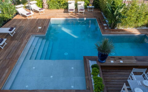 Onda 8: Piscina, Recurso, Mueble Para Exteriores, Material Compuesto, Fuente De Agua, Eco Hotel, Jardín, Ocio, Paisajismo, Silla