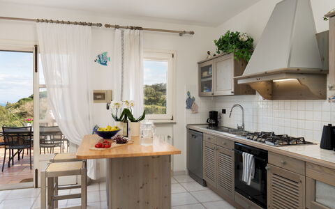 Villa Perelle 8: Mueble, Cocina, Aparato De Cocina, Diseño De Interiores, Mostrador, Piso, Madera, Electrodoméstico, Gabinetes, Suelo