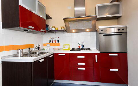 Villa Cristiana: Cocina, Aparato De Cocina, Gabinetes, Mueble, Electrodoméstico, Estufa De Cocina, Mostrador, Madera, Diseño De Interiores, Estufa