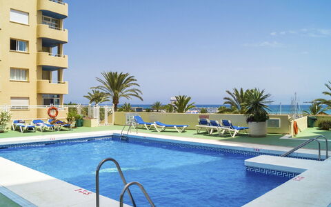 Puerto Paraíso: Piscina, Propiedad, Edificio, Recurso, Departamento, Bienes Raíces, Vacaciones, Condominio, Casa, By